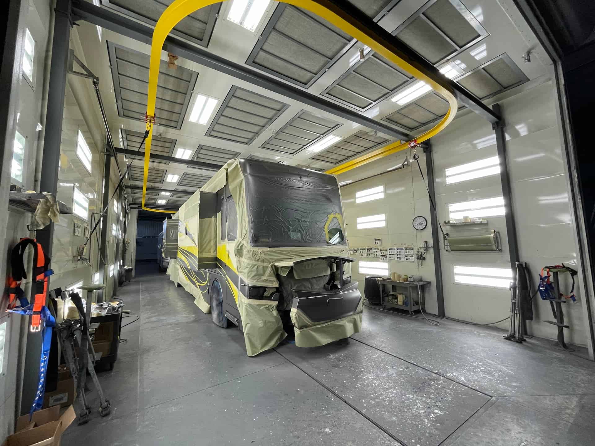 Fall arrest system in RV manufacturer paint booth