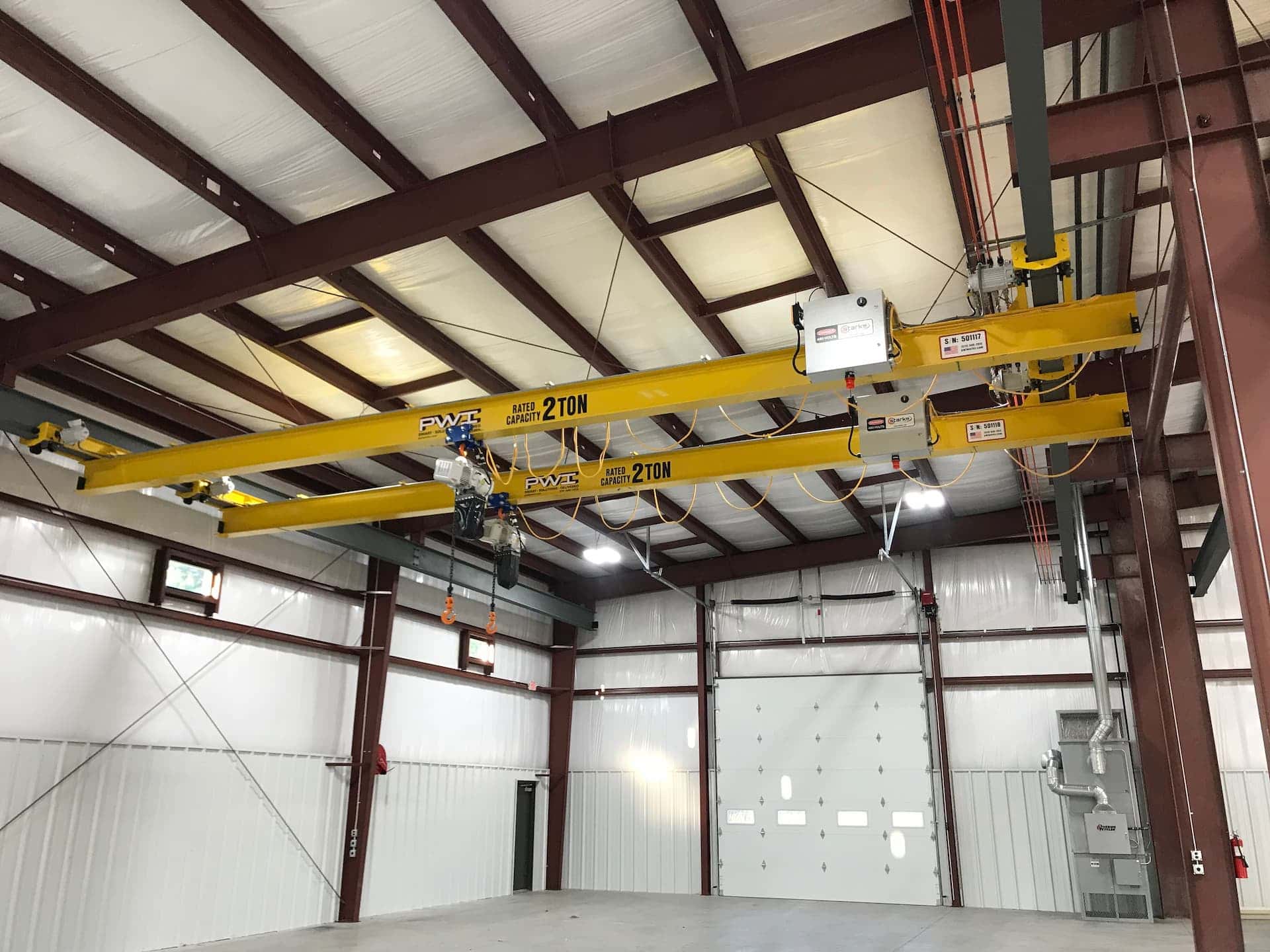 New under running crane installation in manufacturing plant.